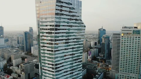 Skyscraper aerial view. Flying around tall building in business center of city Stock Footage 120561639