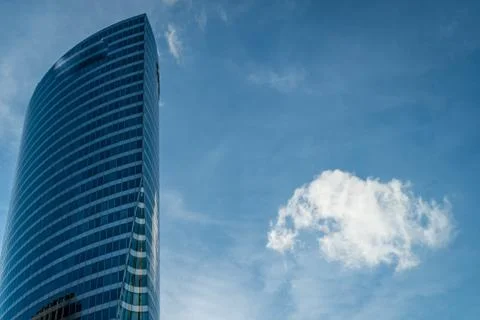 Skyscraper and a cloud Stock Photos