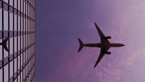 Skyscraper and reflection of a jet departing Stock Footage 270461036