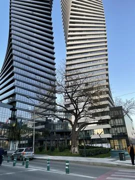 Skyscraper and Sun Stock Photos