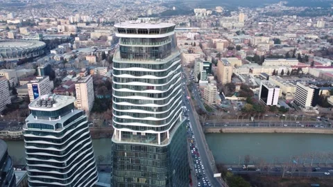 Skyscraper and traffic jam on the bridge Stock Footage 168576759