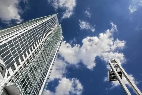 Skyscraper in a blue sky Stock Photos
