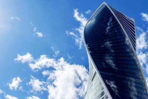 Skyscraper on blue sky Stock Photos