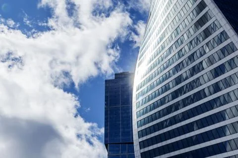 Skyscraper on blue sky Stock Photos