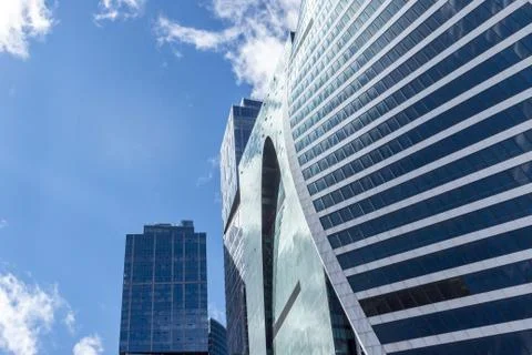 Skyscraper on blue sky Stock Photos