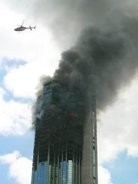 Skyscraper building on fire Stock Photos