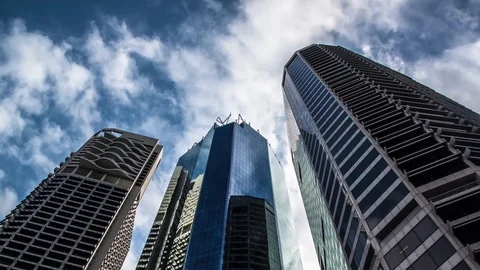 Skyscraper buildings with moving clouds Time Lapse Stock Footage 90945339
