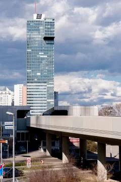 Skyscraper with clouds Stock Photos