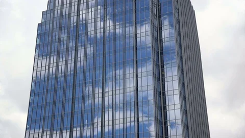 Skyscraper Clouds in Reflection on Building Timelapse Stock Footage 70901884