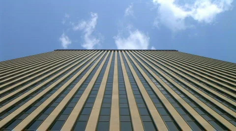 Skyscraper with Clouds Time Lapse Stock Footage 313288