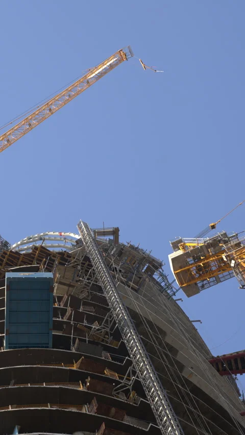Skyscraper construction in Dubai with cranes Stock Footage 341799853