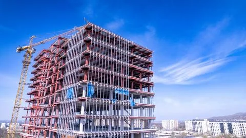 Skyscraper Construction Progress in Urban Landscape Stock Photos