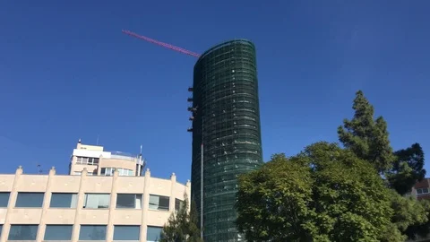 Skyscraper Construction Site Against Blue Sky in Nicosia Video stock 100972660