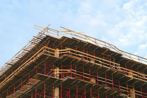 Skyscraper construction site building structure wood and concrete frame Stock Photos
