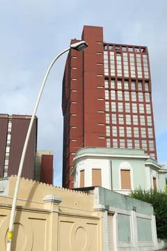 Skyscraper covered with safety net. Stock Photos
