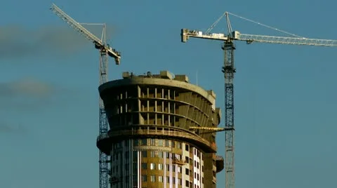 Skyscraper: cranes at work, time-lapse with zooming Stock Footage 10734219