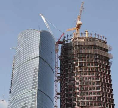 Skyscraper develop on sky background 스톡 사진