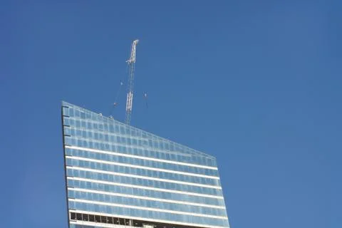 Skyscraper develop on sky background Stock Photos