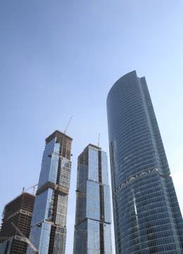 Skyscraper develop on sky background Stock Photos