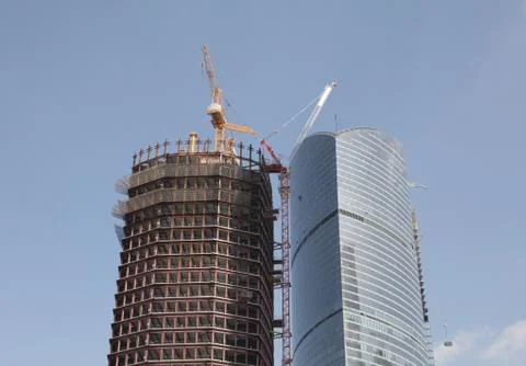 Skyscraper develop on sky background Stock Photos