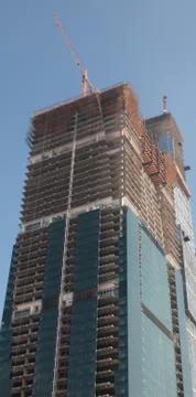 Skyscraper develop on sky background Stock Photos