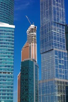 Skyscraper develop on sky background Stock Photos