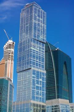 Skyscraper develop on sky background Stock Photos