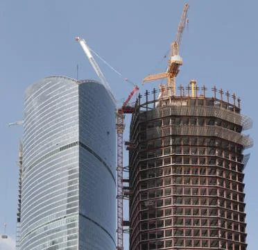 Skyscraper develop on sky background Stock Photos