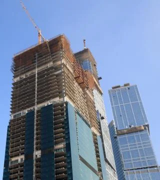 Skyscraper develop on sky background 스톡 사진