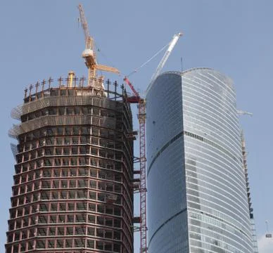 Skyscraper develop on sky background 스톡 사진