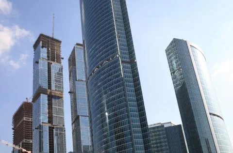 Skyscraper develop on sky background Stock Photos