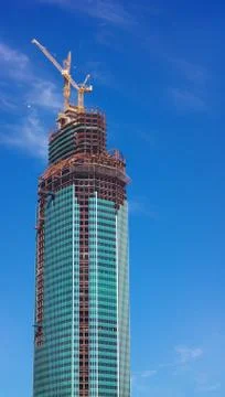 Skyscraper develop on sky background Stock Photos