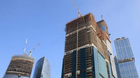 Skyscraper develop on sky background Stock Photos