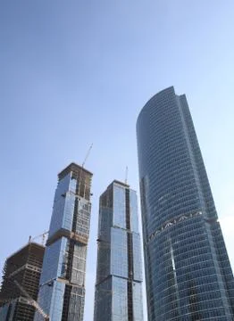 Skyscraper develop on sky background Stock Photos