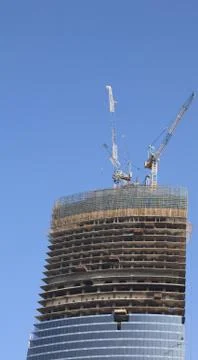 Skyscraper develop on sky background 스톡 사진