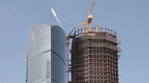 Skyscraper develop on sky background Stock Photos