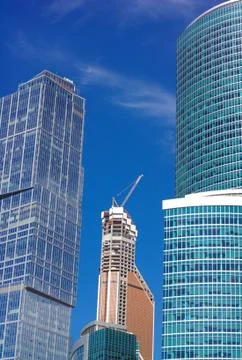 Skyscraper develop on sky background Stock Photos