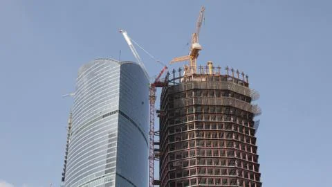 Skyscraper develop on sky background Stock Photos