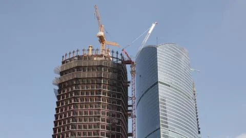 Skyscraper develop on sky background Stock Photos