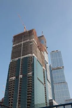 Skyscraper develop on sky background 스톡 사진