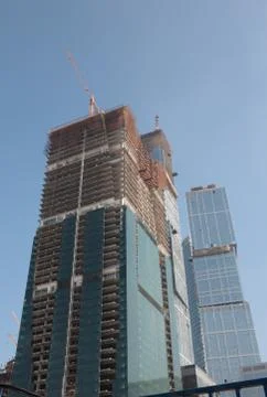 Skyscraper develop on sky background 스톡 사진
