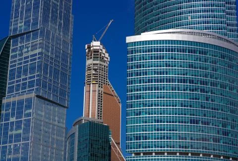 Skyscraper develop on sky background Stock Photos