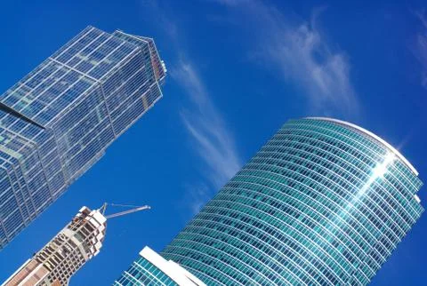 Skyscraper develop on sky background Stock Photos