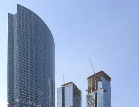 Skyscraper develop on sky background Stock Photos