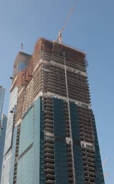 Skyscraper develop on sky background Stock Photos