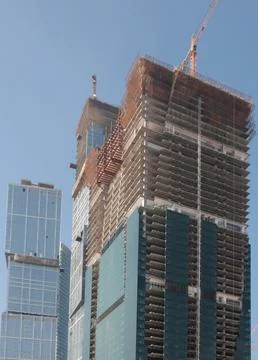 Skyscraper develop on sky background Stock Photos