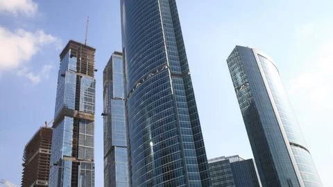 Skyscraper develop on sky background Stock Photos