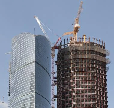 Skyscraper develop on sky background Stock Photos