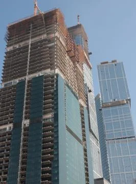 Skyscraper develop on sky background 스톡 사진