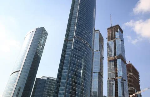 Skyscraper develop on sky background Stock Photos